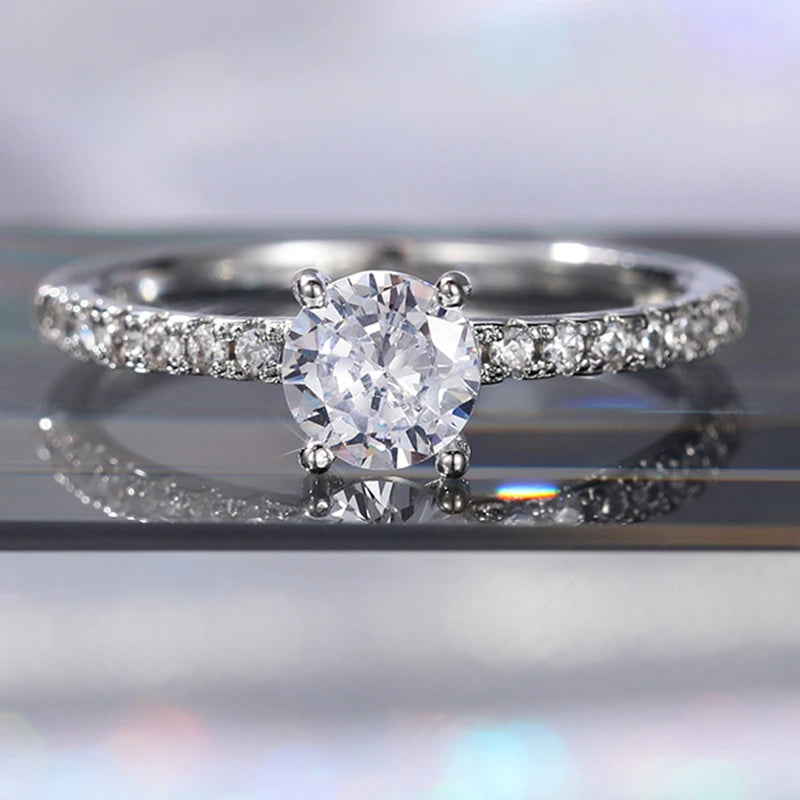 Huitan 925 Sterling Silver Rings for Women Simple and Classic 4 Claw Setting CZ Rings Engagement Wedding Eternity Fine Jewelry - You Offer