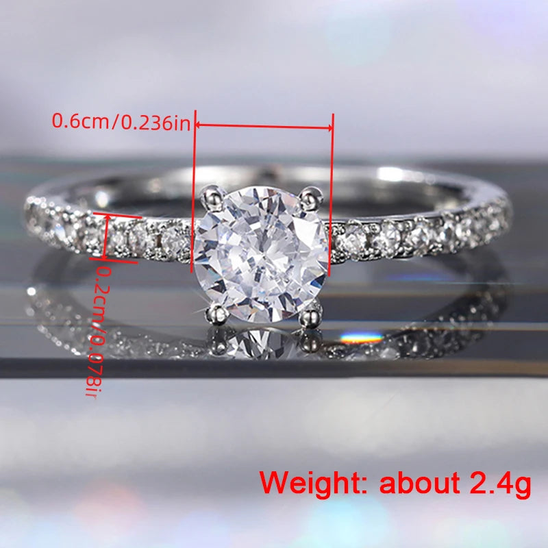Huitan 925 Sterling Silver Rings for Women Simple and Classic 4 Claw Setting CZ Rings Engagement Wedding Eternity Fine Jewelry - You Offer